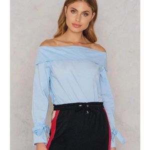 Lucca Large chambray off shoulder blouse with long sleeves and feminine bows.